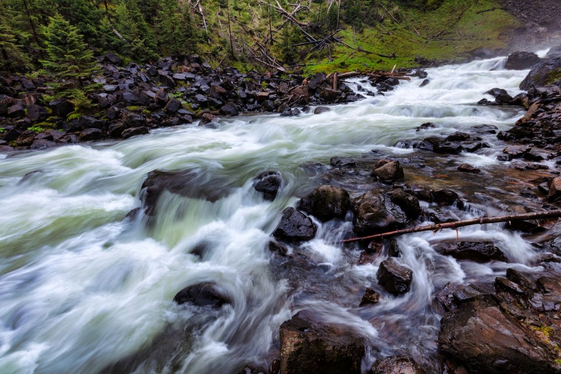 Racing, foamy river water